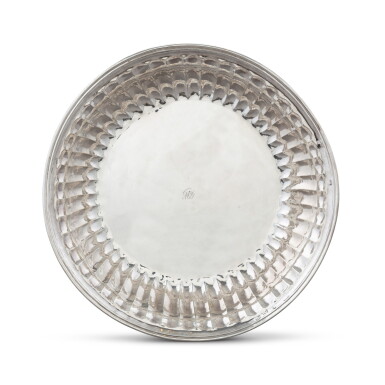 View full screen - View 1 of Lot 112. A very large circular gadrooned basin, probably Mexico circa 1730 | Très grand bassin rond godronné en argent, probablement Mexique vers 1730.