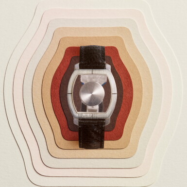 View full screen - View 1 of Lot 52. Mystère Tortue | An extremely rare and unusual white gold tonneau form rear-wound mystery wristwatch with white gold deployant buckle | Circa 1973.