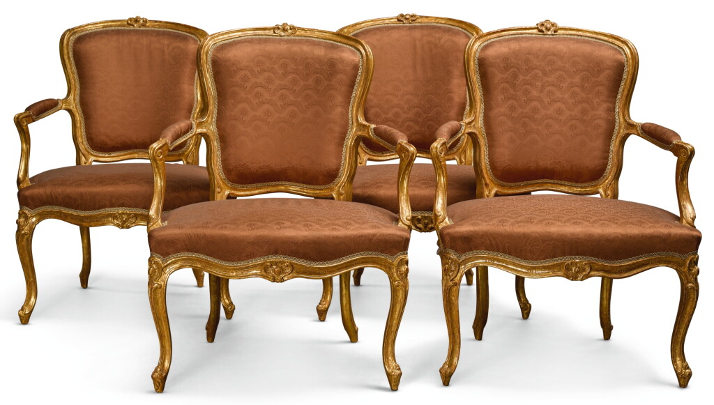 View full screen - View 1 of Lot 180. A SET OF FOUR LOUIS XV CARVED GILTWOOD FAUTEUILS EN CABRIOLET BY FRANÇOIS REUZE MID-18TH CENTURY.