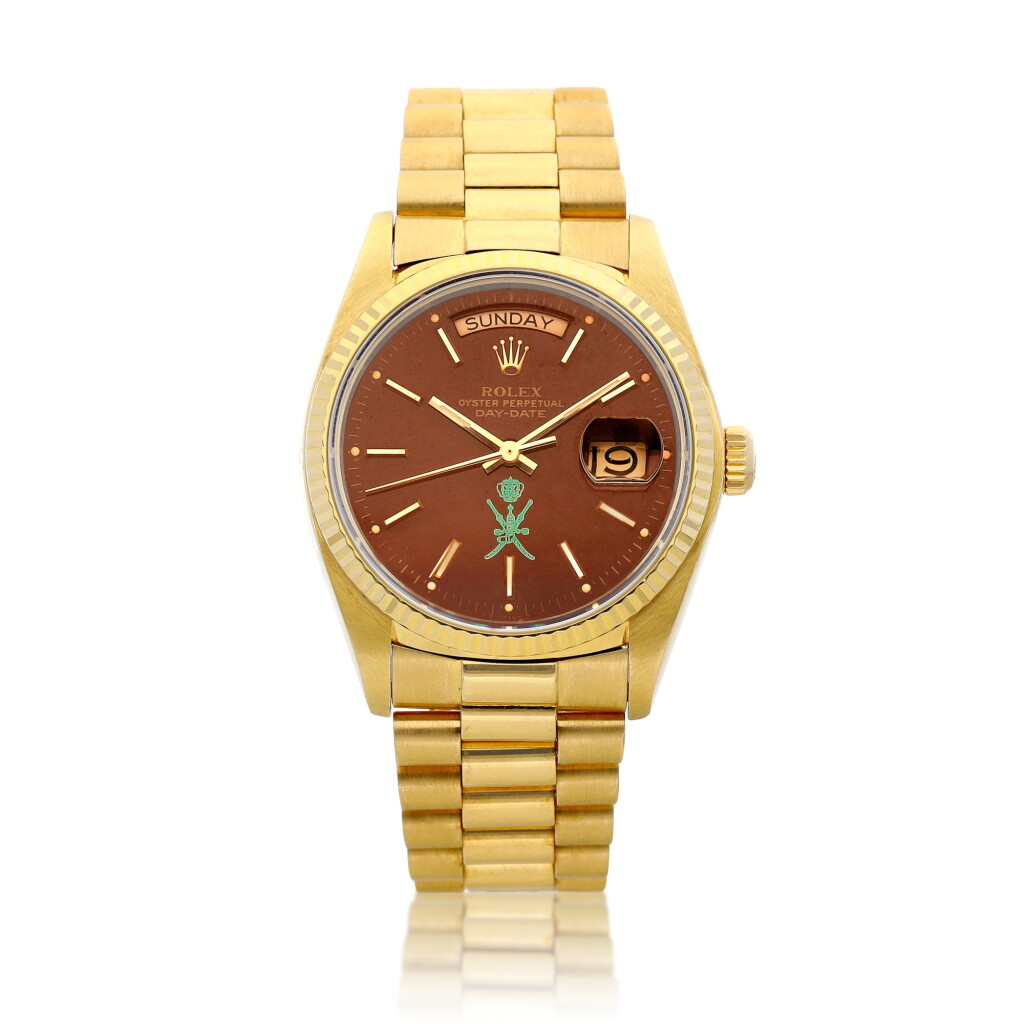 View full screen - View 1 of Lot 8018. Day-Date, Reference 18038, A yellow gold wristwatch with day, date, bracelet, oxblood "Stella" dial and later green stamp, Circa 1980 Day-Date | 勞力士 型號18038 黃金鏈帶腕錶,備日期、星期顯示及牛血紅 "Stella" 錶盤及後期綠色印記,約1980年製.