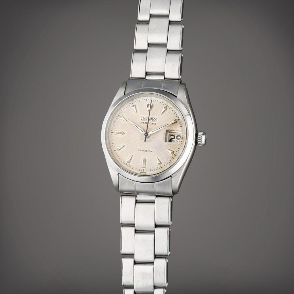 View full screen - View 1 of Lot 135. Reference 6294 Oysterdate Precision | A stainless steel wristwatch with roulette date wheel, bracelet, and honeycomb dial, Circa 1954.