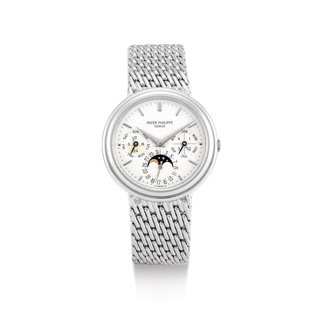 View full screen - View 1 of Lot 2045. PATEK PHILIPPE | REFERENCE 3945/1, A WHITE GOLD PERPETUAL CALENDAR BRACELET WATCH WITH MOON PHASES, 24 HOUR AND LEAP YEAR INDICATION, CIRCA 1991 | 百達翡麗 | "型號3945/1 白金萬年曆鏈帶腕錶,備月相、24小時及閏年顯示,機芯編號772766,錶殼編號2875136,約1991年製".