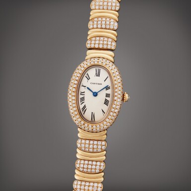 View full screen - View 1 of Lot 83. Reference 0559 Baignoire | A yellow gold and diamond-set oval bracelet watch, Circa 2005.