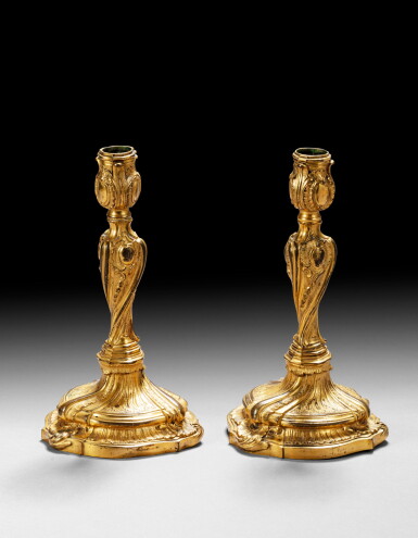 View full screen - View 1 of Lot 70. A pair of Louis XV gilt-bronze candlesticks, circa 1750 | Paire de flambeaux en bronze doré d'époque Louis XV, vers 1750.
