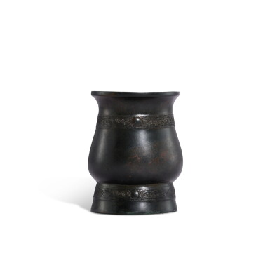 View full screen - View 1 of Lot 717. An inscribed bronze ritual wine vessel, zhi, Late Shang dynasty | 商晚期 青銅父戊觶.