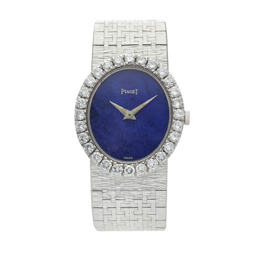 View full screen - View 1 of Lot 98. Reference 9814 A 6 A white gold and diamond-set bracelet watch with lapis lazuli dial, Circa 1976.