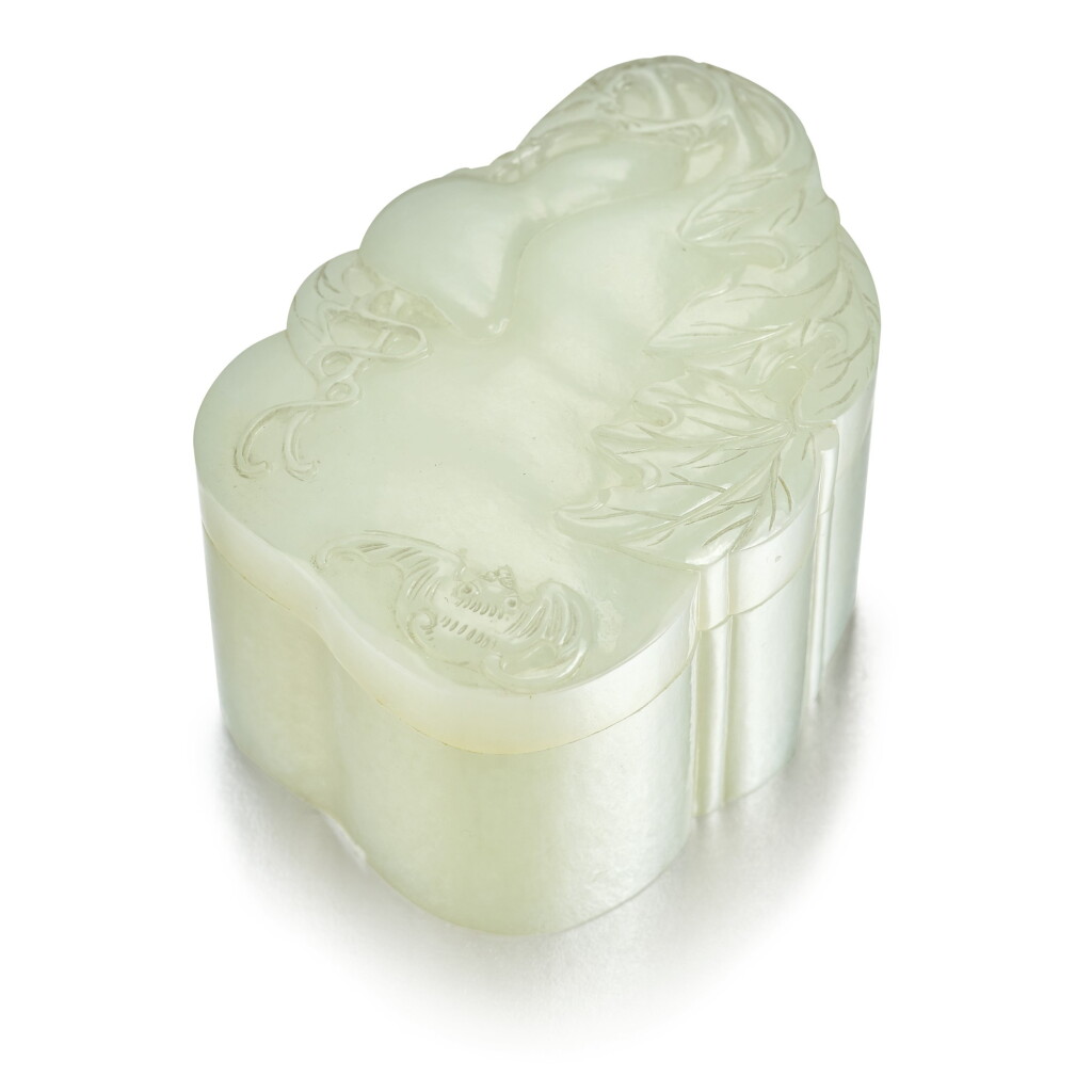 View full screen - View 1 of Lot 1. A pale celadon jade gourd-form box and cover, Qing dynasty, 19th century | 清十九世紀 青白玉雕福祿萬代蓋盒.