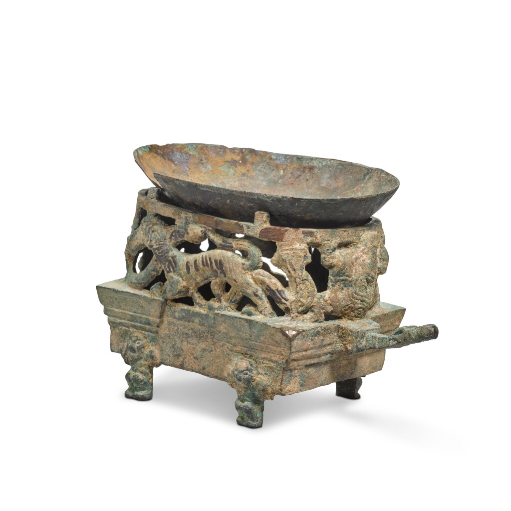View full screen - View 1 of Lot 407. A set of bronze brazier and cup (ranlu), Eastern Zhou dynasty, Warring States period / Eastern Han dynasty | 東周戰國 / 東漢 青銅四神獸紋染爐.
