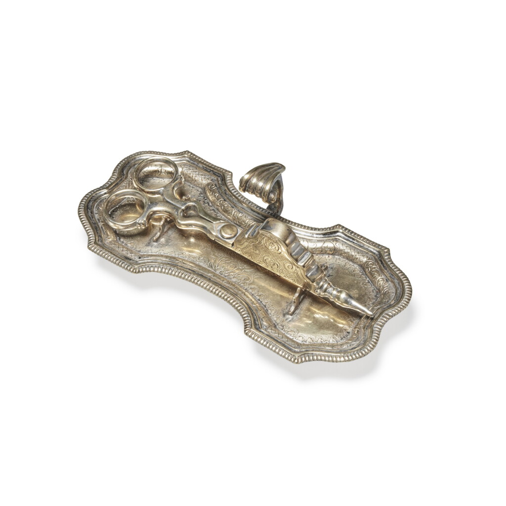 View full screen - View 1 of Lot 870. A French Silvered Cast-Brass Snuffer and Tray, 18th century.