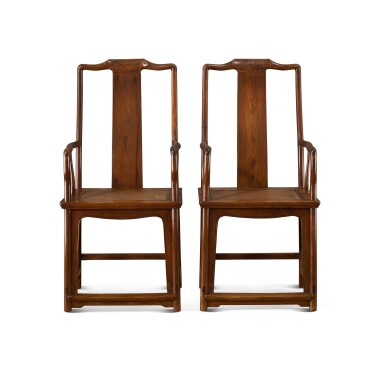 View full screen - View 1 of Lot 469. A pair of huanghuali continuous yokeback armchairs, Nanguanmaoyi, Qing dynasty, 17th century 清十七世紀 黃花梨南官帽椅一對.