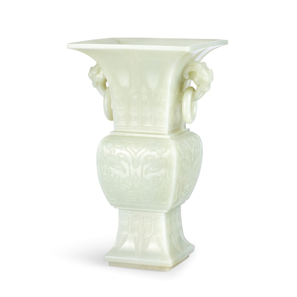 View full screen - View 1 of Lot 3616. An archaistic white jade handled vase, fanggu Qing dynasty, Qianlong period | 清乾隆 白玉仿古饕餮紋雙環活環耳方觚.