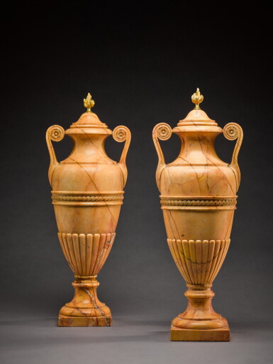 View full screen - View 1 of Lot 101. A pair of Italian carved giallo di Siena marble vases, early 19th century.