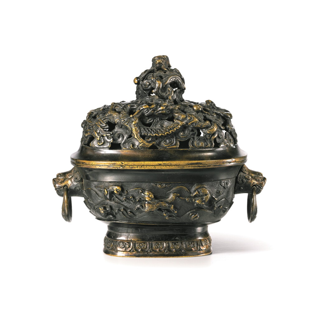View full screen - View 1 of Lot 40. A PARCEL-GILT 'MYTHICAL BEAST' CENSER AND COVER, QING DYNASTY, KANGXI PERIOD | 清康熙 局部鎏金銅海獸雲龍紋蓋爐.