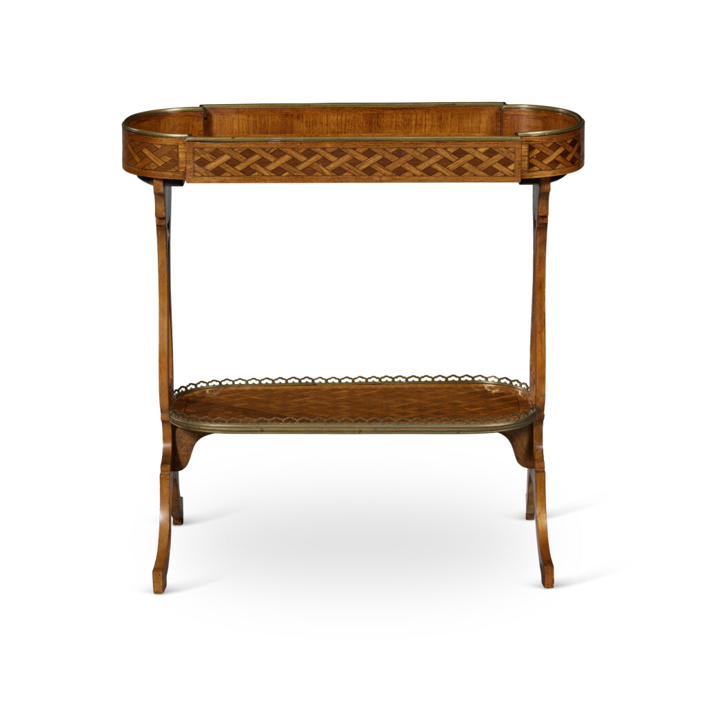View full screen - View 1 of Lot 103. A Louis XVI Style Gilt-Bronze Mounted Tulipwood and Sycamore Table Vide Poche.
