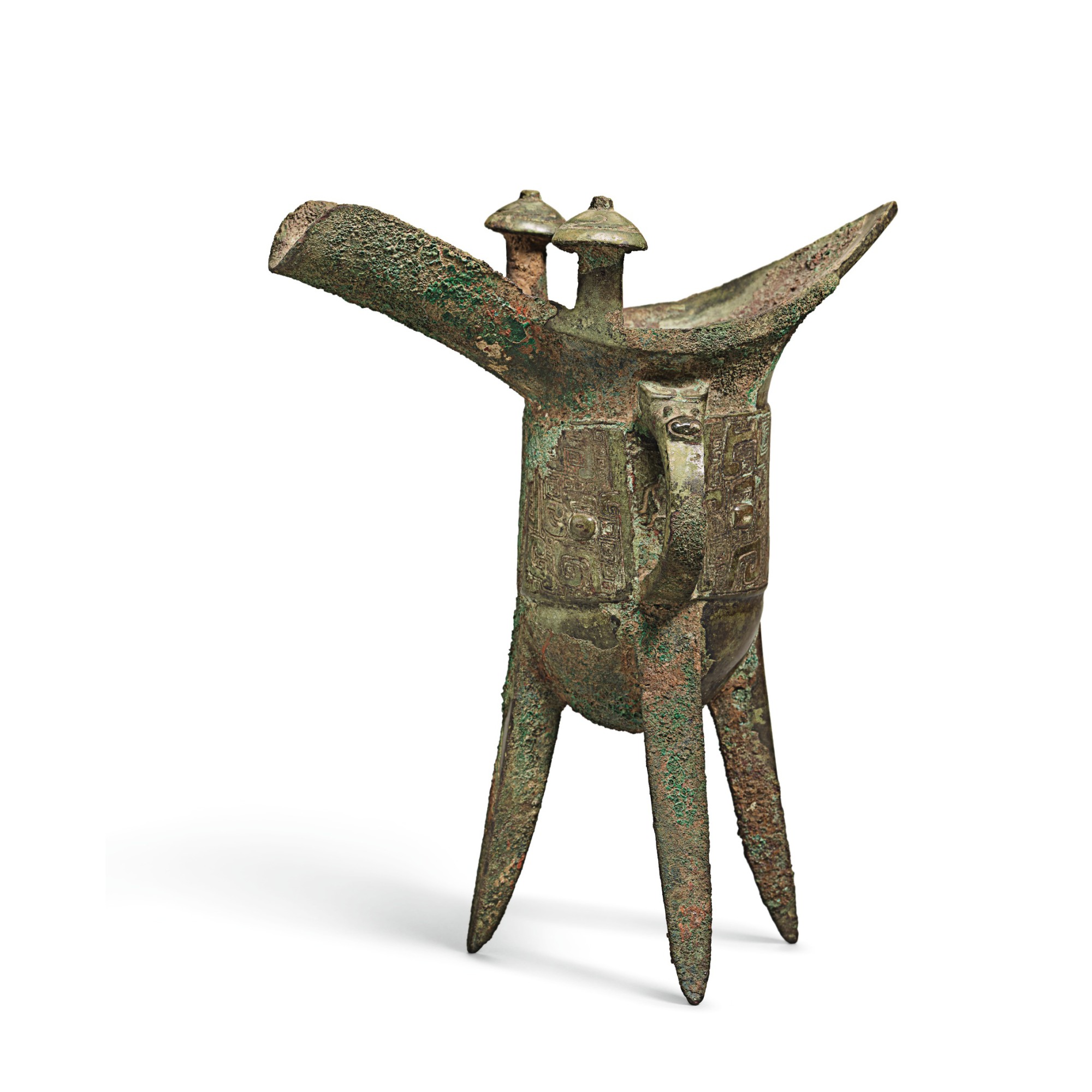 AN ARCHAIC BRONZE RITUAL WINE VESSEL, JUE, LATE SHANG/EARLY WESTERN ...