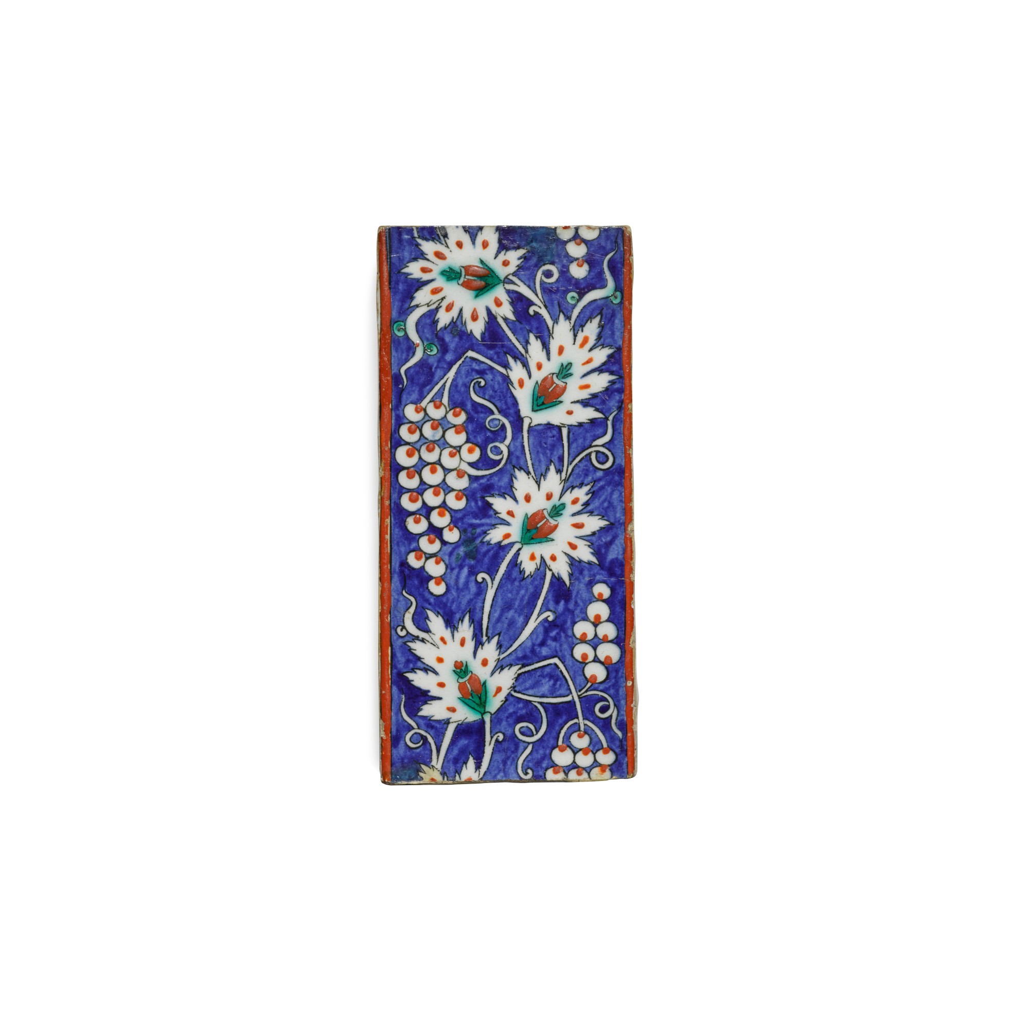 An Iznik polychrome pottery border tile with grapes, Turkey, circa 158085 Arts of the Islamic