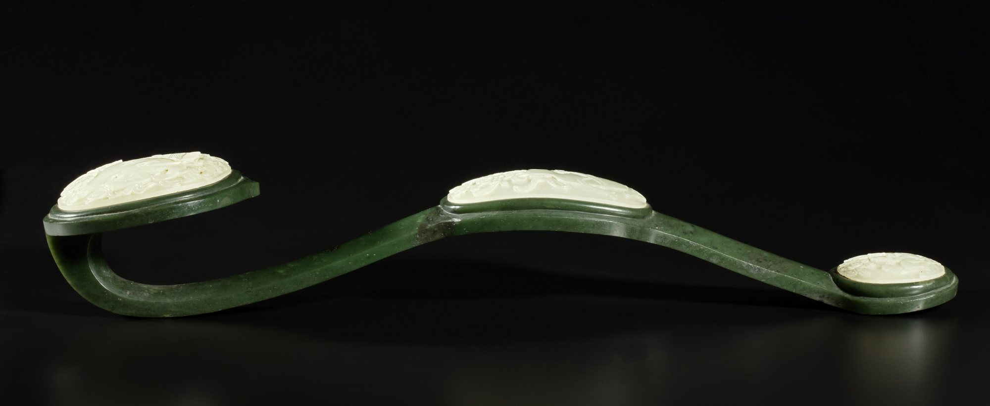 A white jade-inset spinach-green jade ruyi scepter, Qing dynasty, 19th ...
