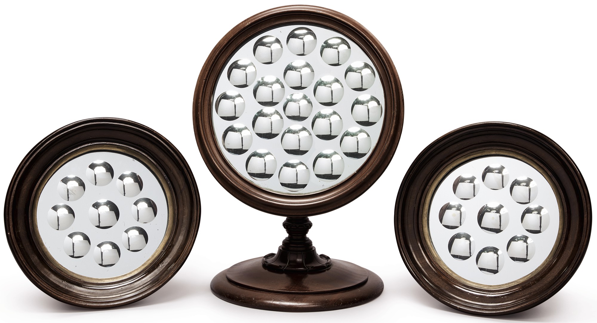 A STANDING OPTICAL MIRROR TOGETHER WITH THREE OPTICAL WALL MIRRORS