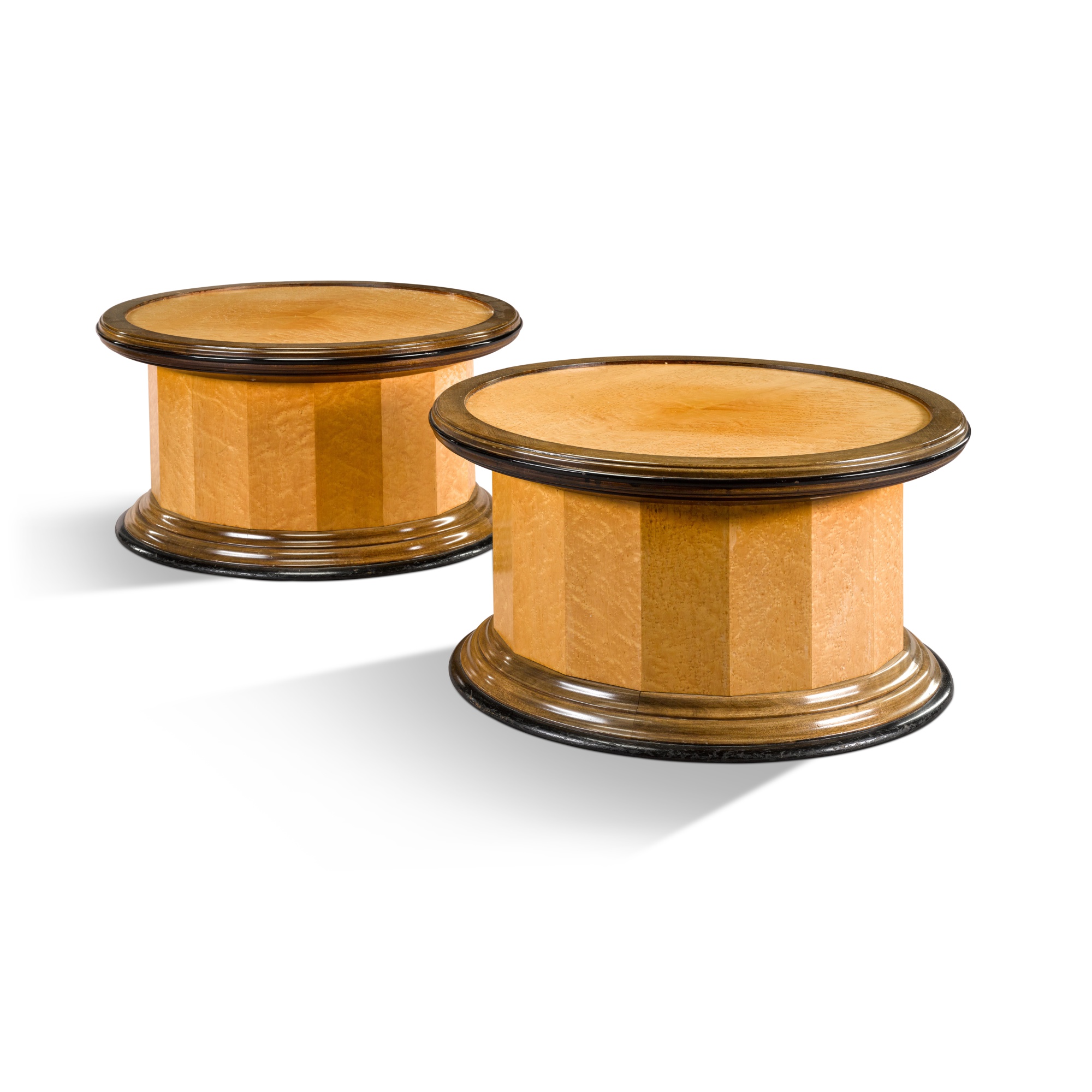 A pair of bird's eye maple and mahogany 'capstan' occasional tables