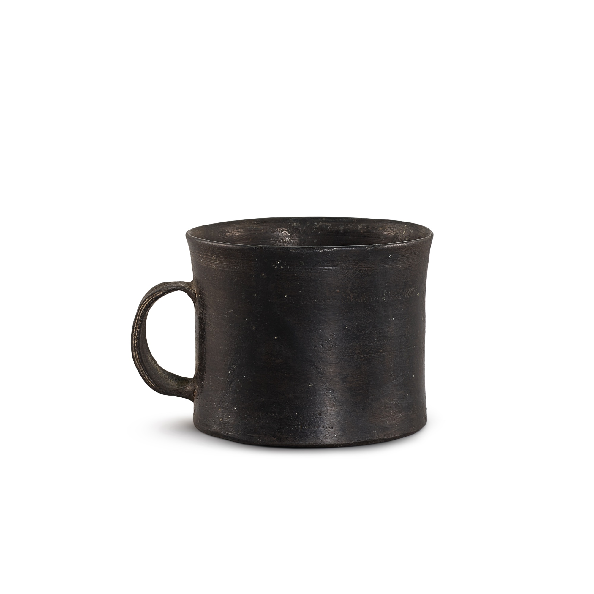 A small black pottery cup, Longshan culture, c. 25002000 B.C. 龍山文化 黑陶盃