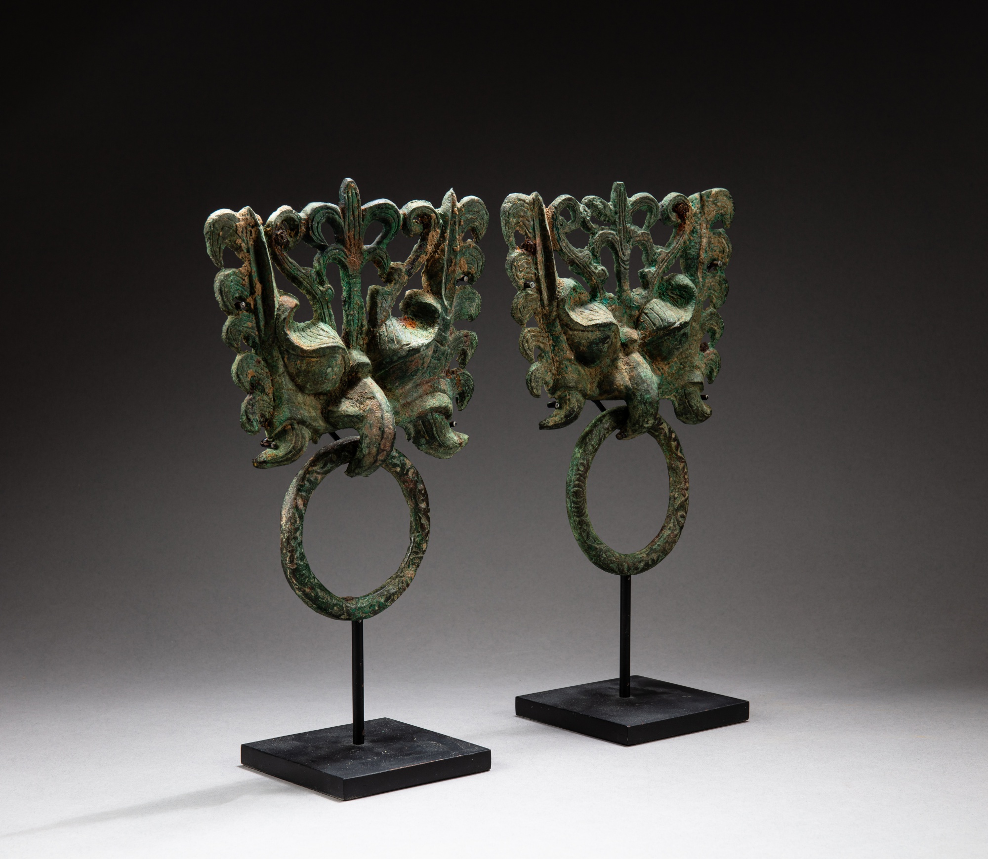 A pair of bronze 'taotie mask' ring handles, Six Dynasties period, 6th ...