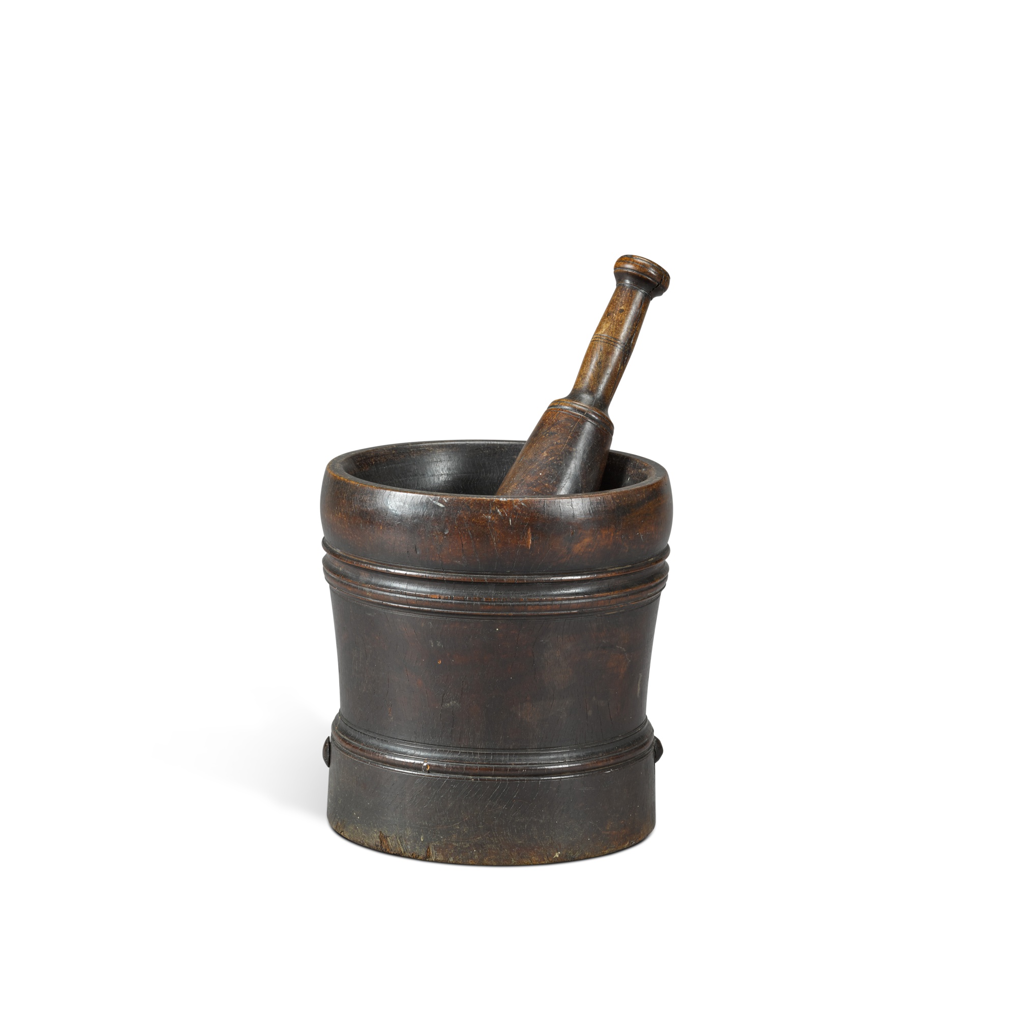 An English boldly turned lignum vitae mortar and pestle, 17th century