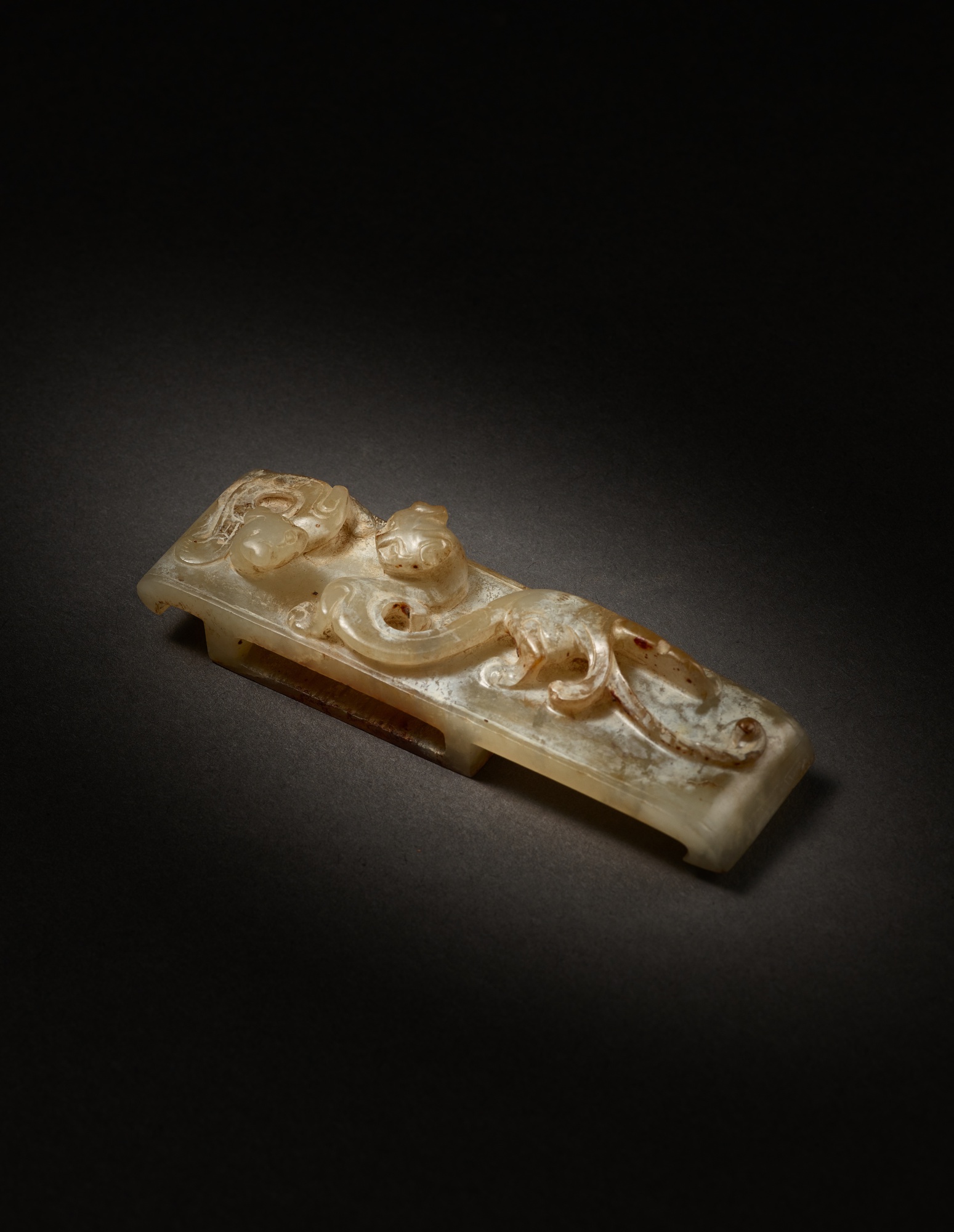 An archaic jade 'chilong' scabbard slide, Han dynasty | 漢 玉螭龍紋璏 ...