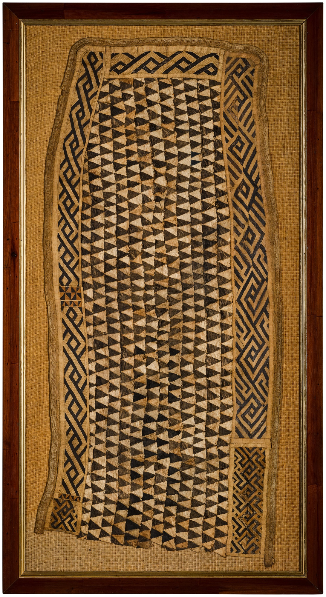 A Kuba woven raffia and embroidered textile, The Democratic Republic of ...