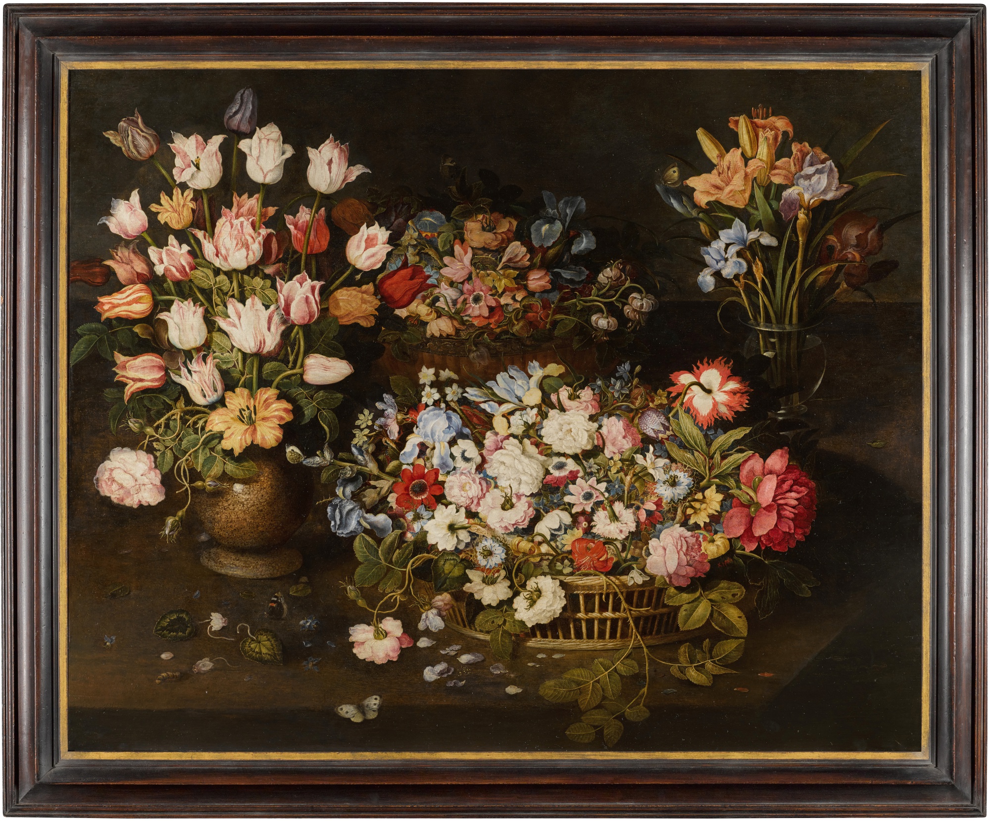 Still life of tulips and an apothecary's rose in a stoneware vase ...