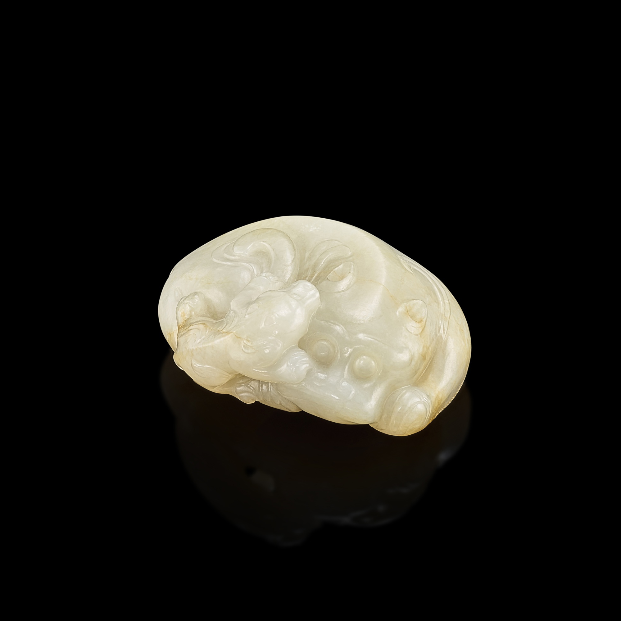 A white and russet jade 'badgers' group, Ming dynasty 明 白玉子母雙獾 The