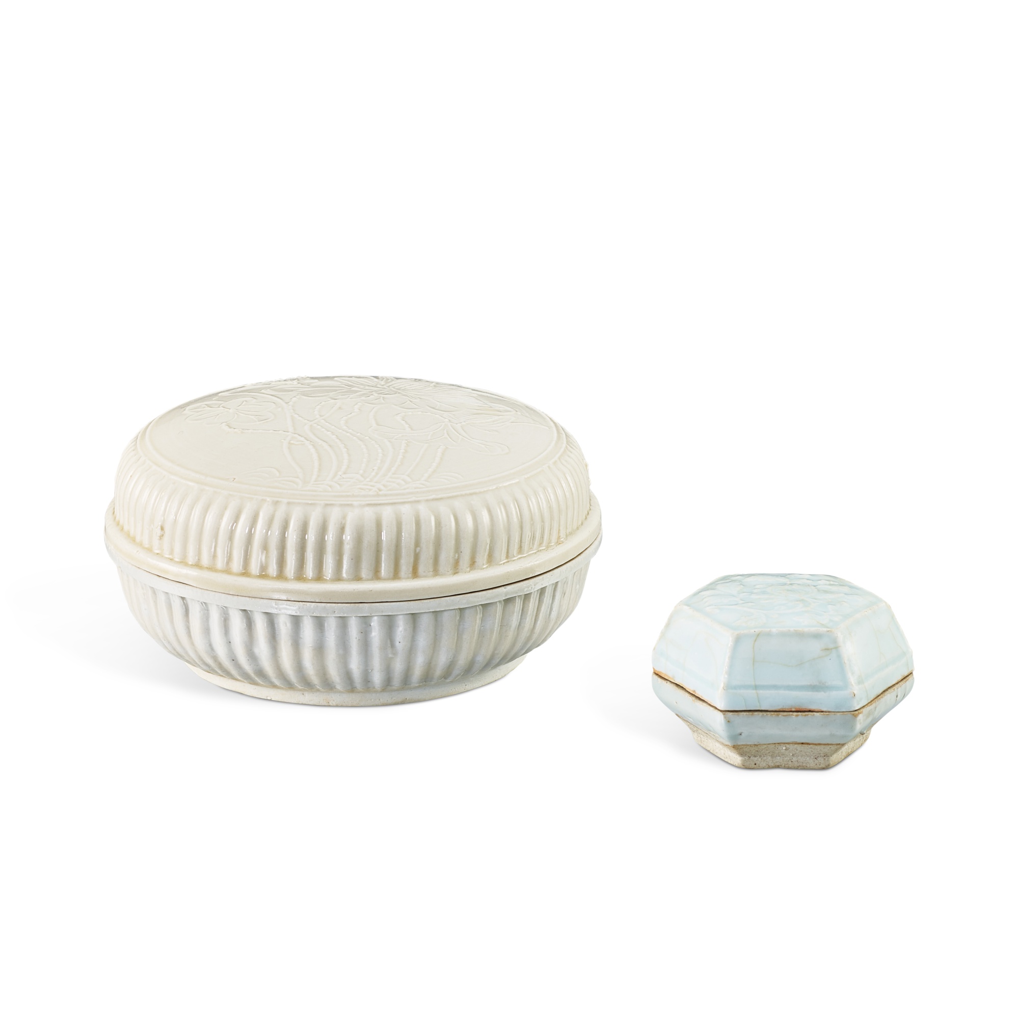 A moulded qingbai 'peony' hexagonal box, Yuan dynasty and a Dehua ...