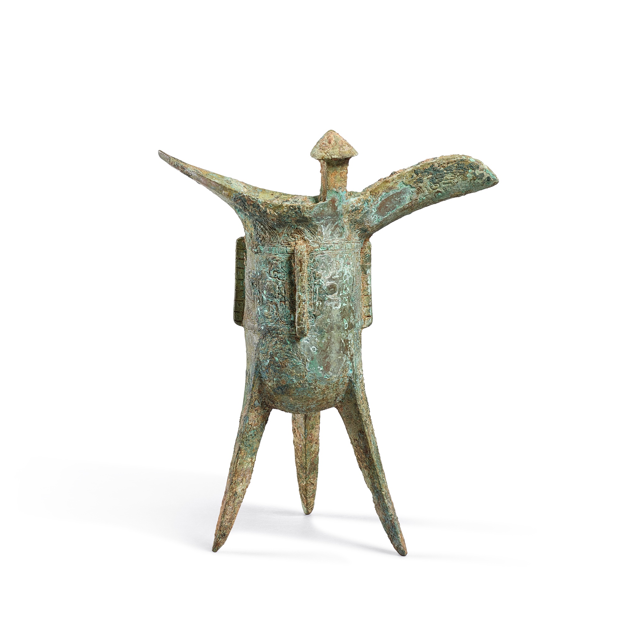An inscribed archaic bronze ritual wine vessel, jue, Late Shang dynasty ...