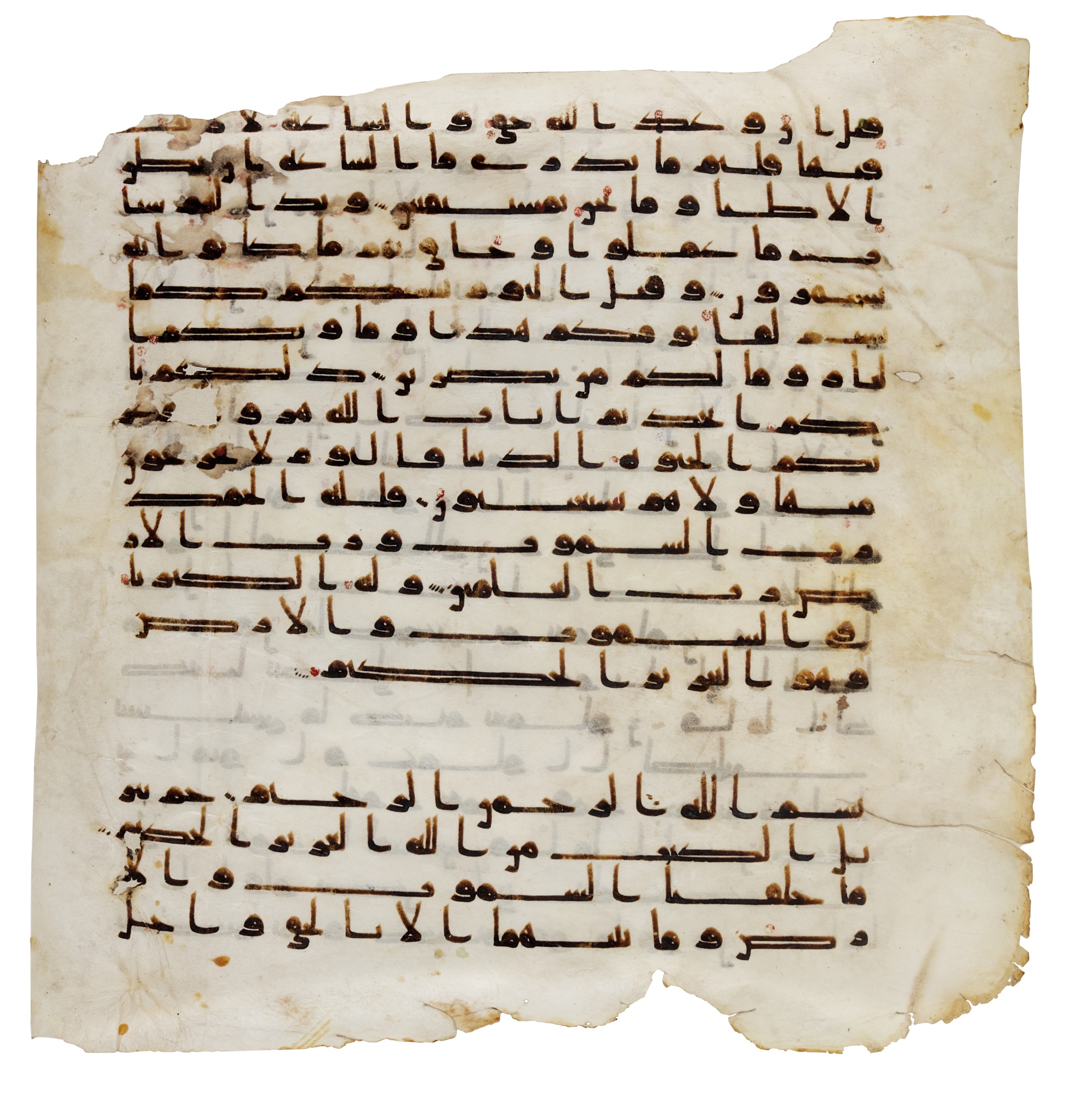 A large Qur’an leaf in Kufic script on vellum, North Africa or Near ...