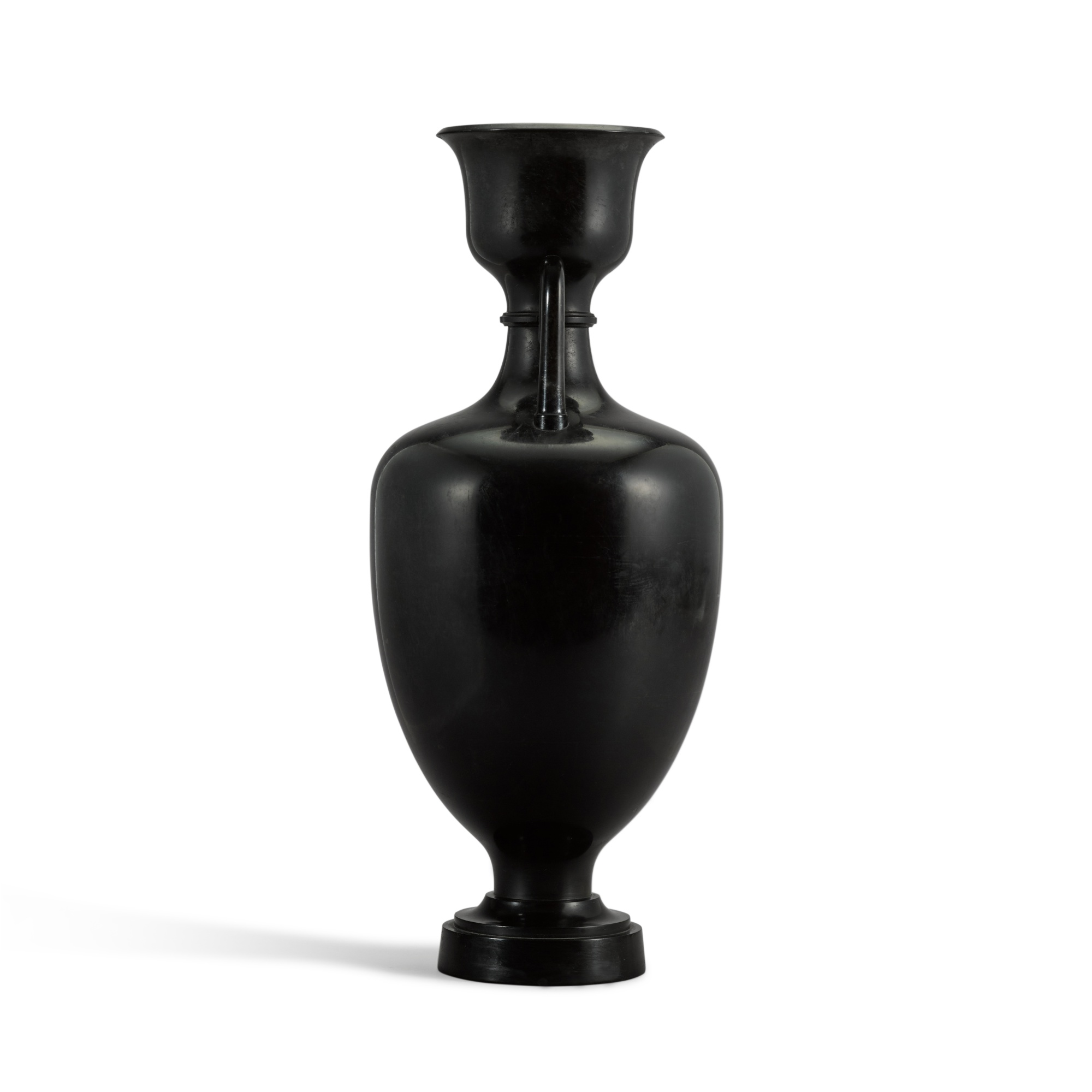 A Regency carved and turned 'Ashford marble' amphora vase, circa 1820