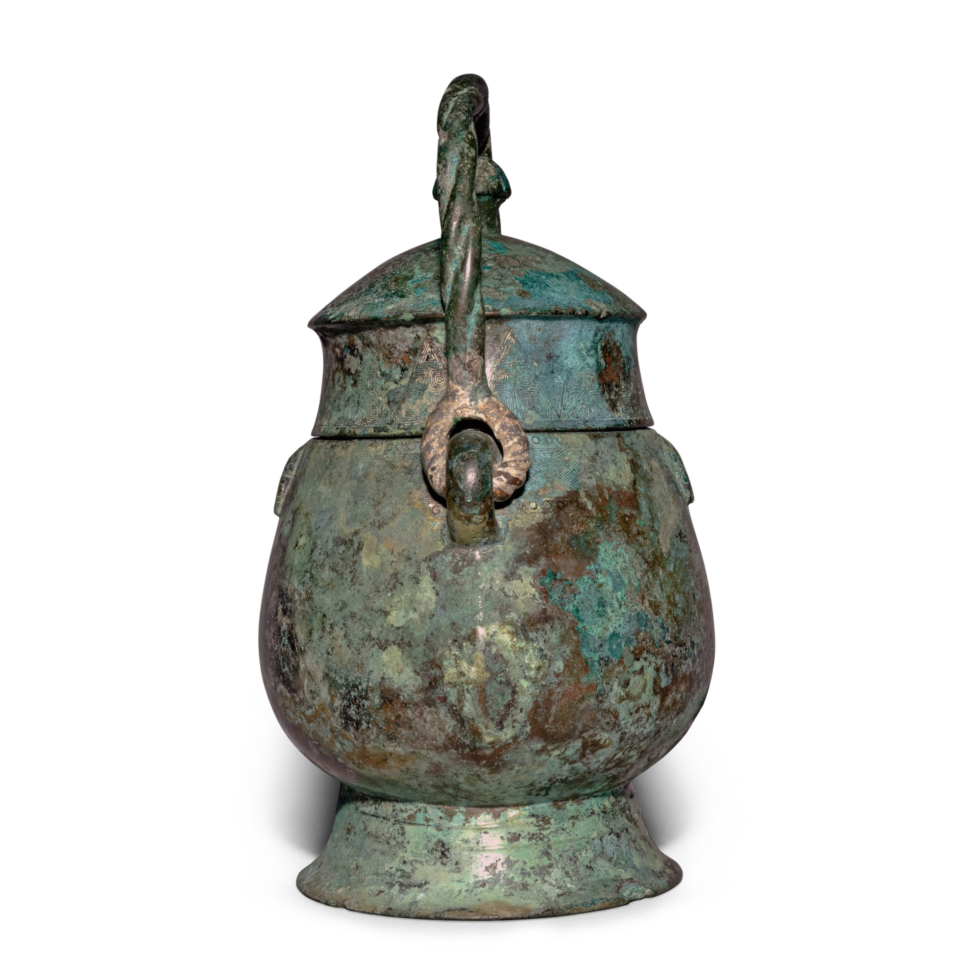 An important inscribed archaic bronze ritual wine vessel (You), Late ...