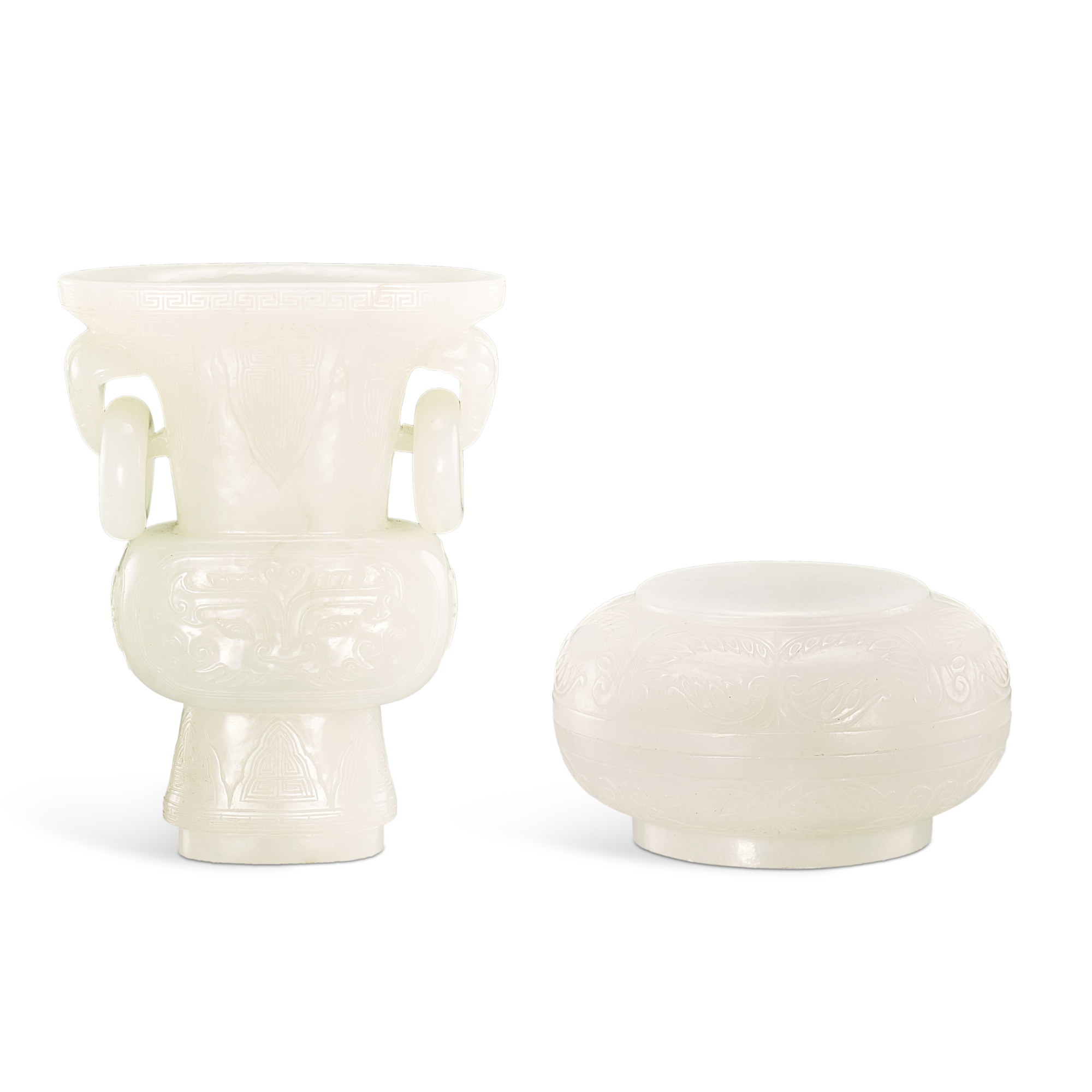 A white jade archaistic gu vase and a circular box and cover, Late Qing