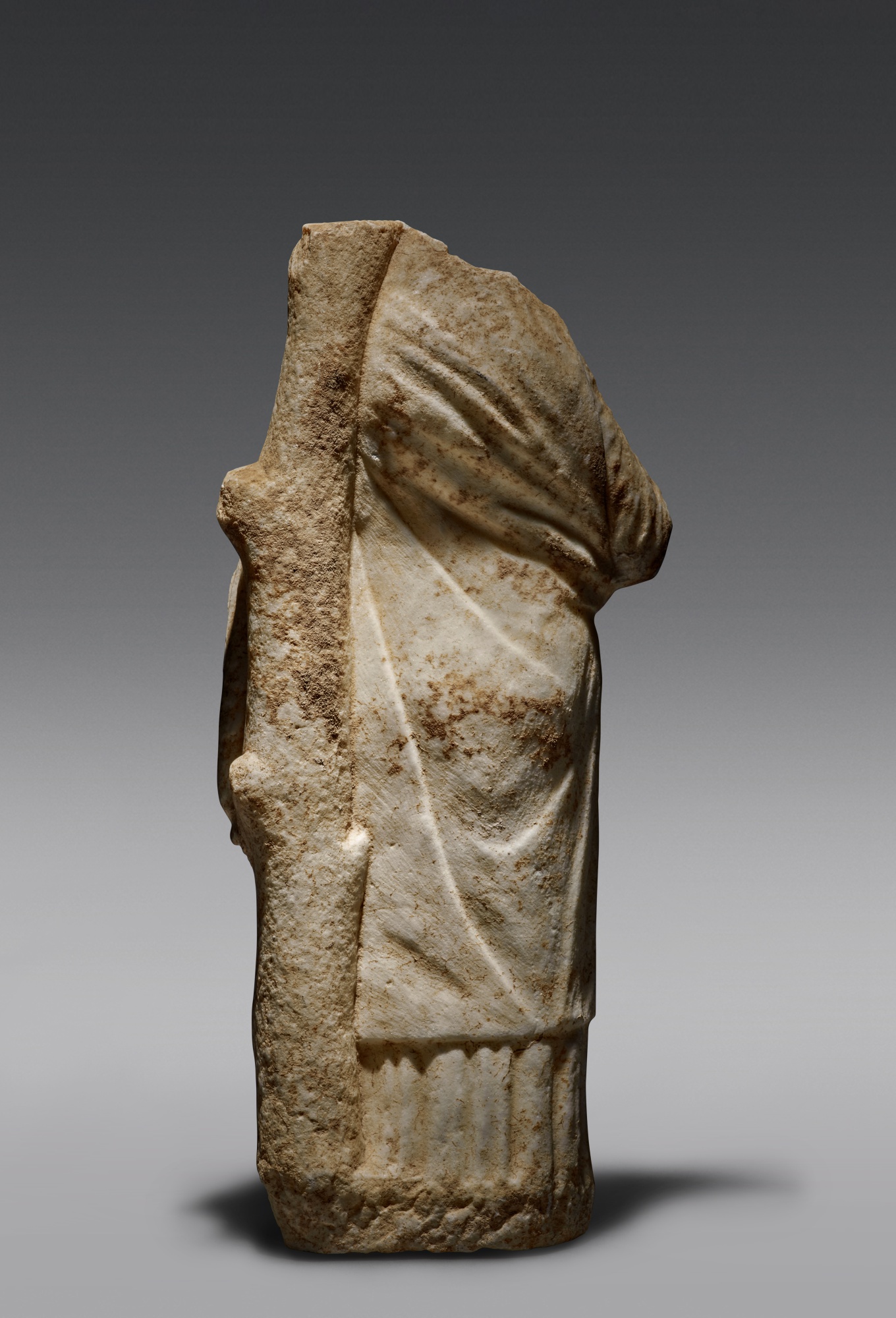 A Greek Marble Figure of a Goddess, mid 4th Century B.C. Ancient