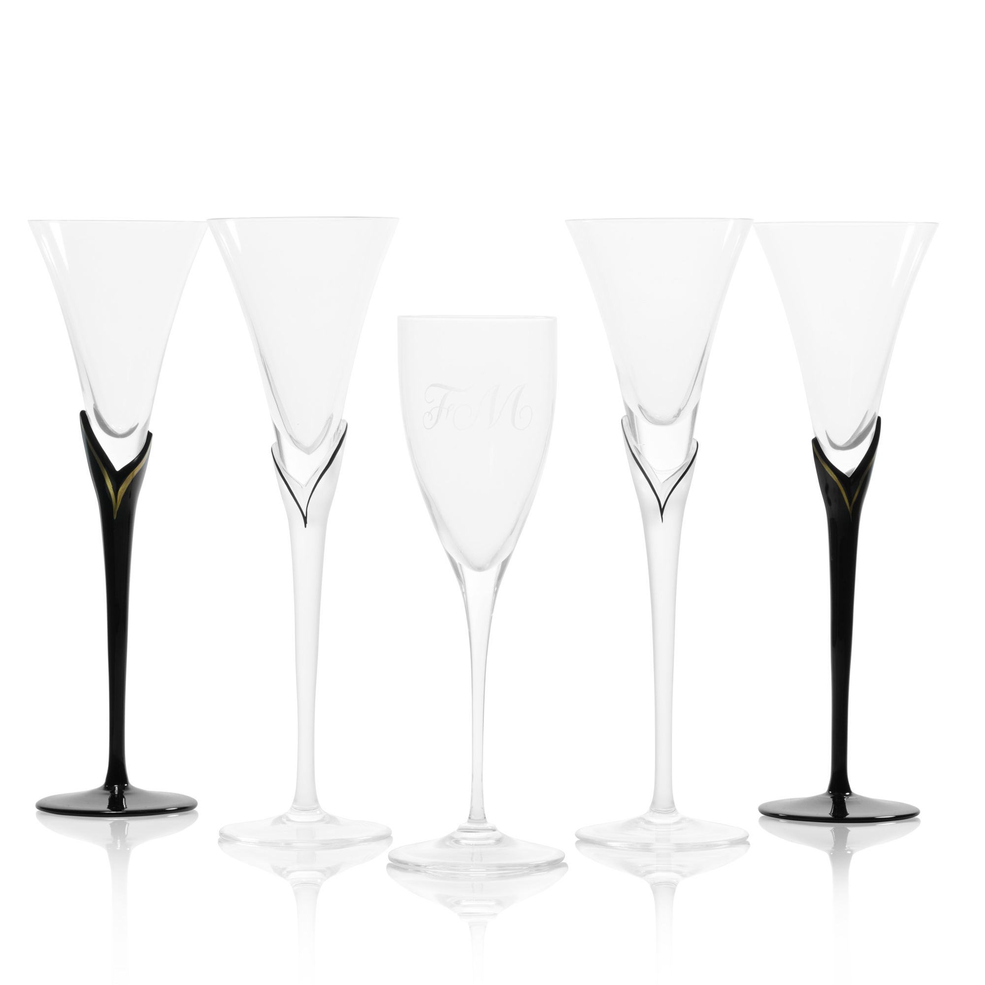 Various glass champagne flutes, 20th century Freddie Mercury A World